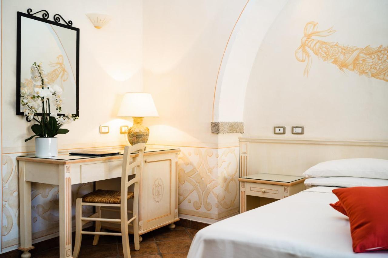 Lh Hotel Pozzo Sacro Olbia Buitenkant foto